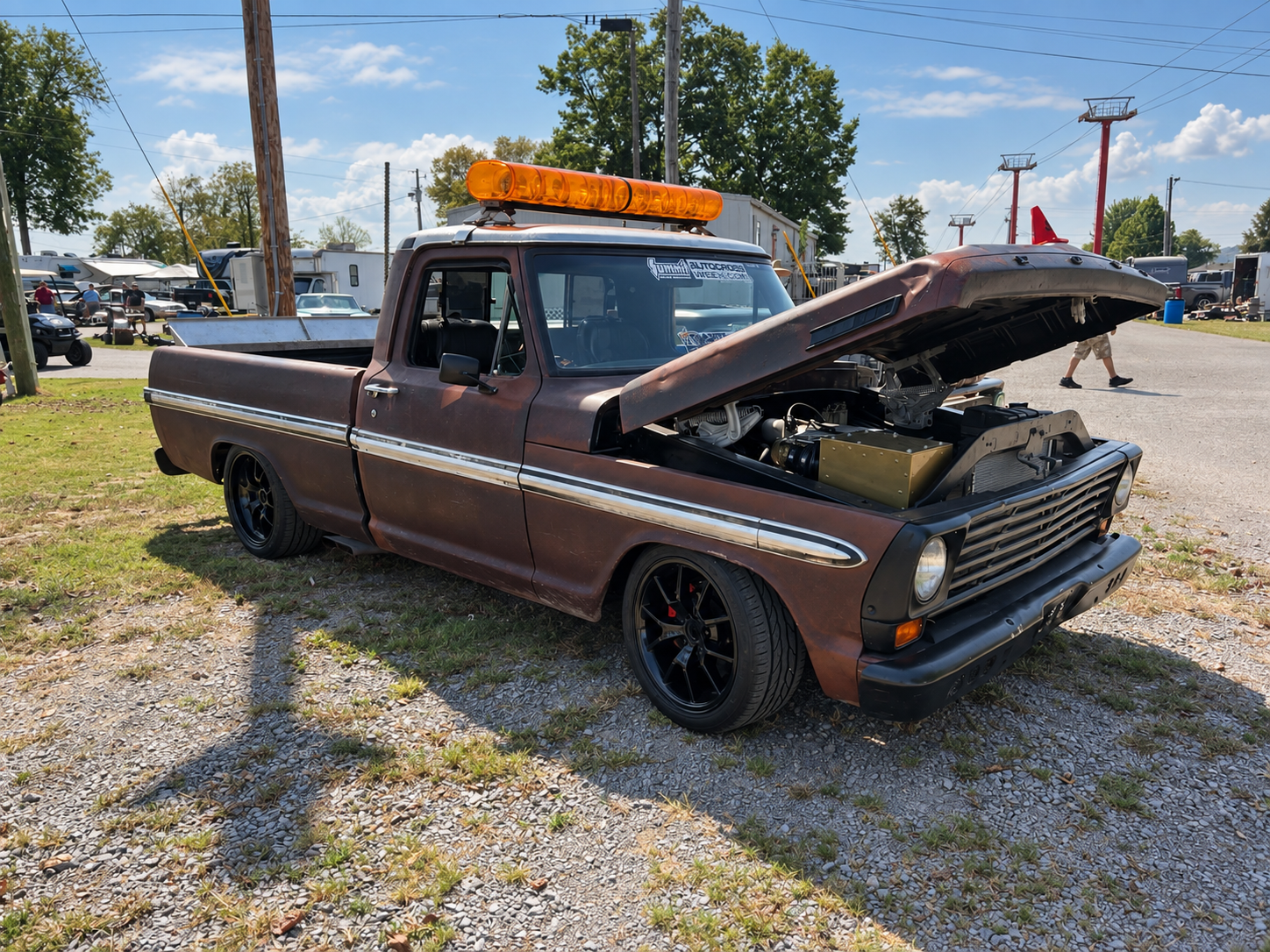 Patina C10 with an amber roof light at the Fall Redneck Rumble 2026